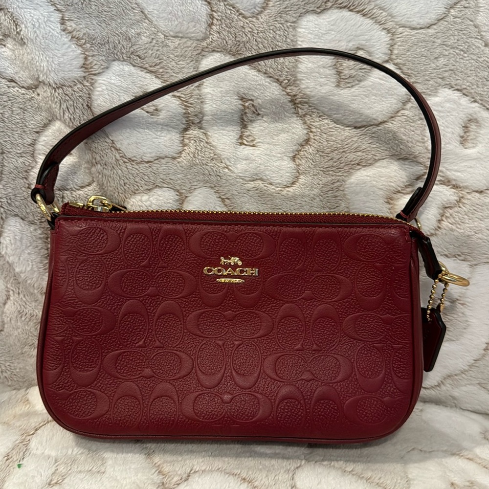 Coach signature wristlet color deep red